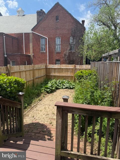 331 5th Street Southeast Washington, DC 20003 - Photo 26 of 27 a view of a brick house with a large window