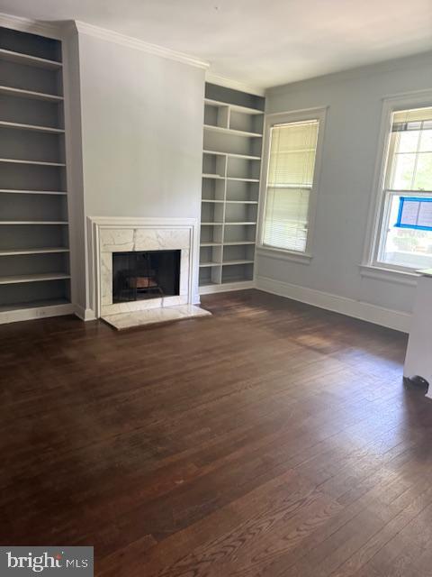 331 5th Street Southeast Washington, DC 20003 - Photo 3 of 27 a view of an empty room with wooden floor fireplace and a window