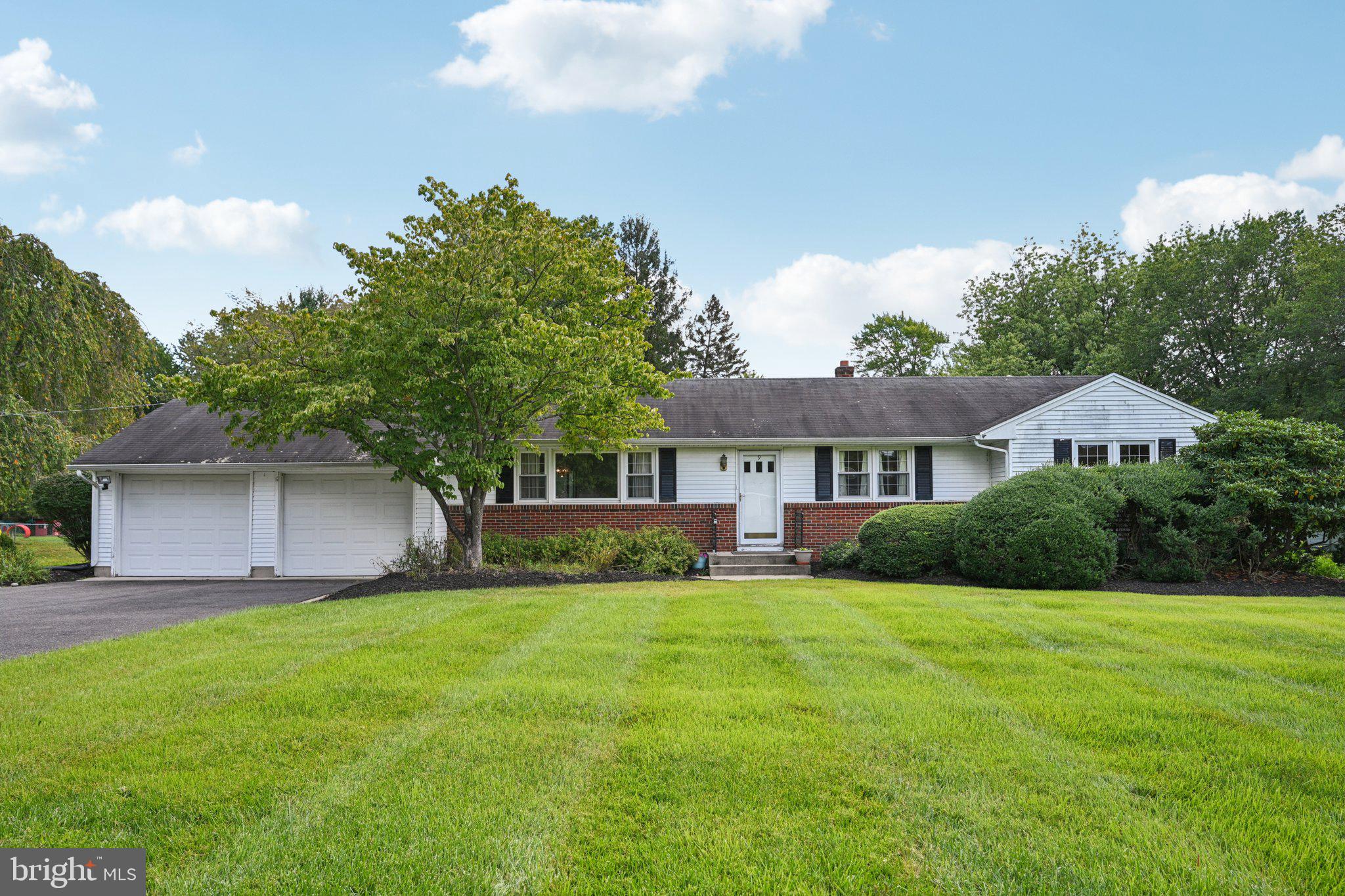 9 Cooper Tomlinson Road Medford, NJ 08055 - Photo 1 of 39 a view of a house with a big yard and potted plants