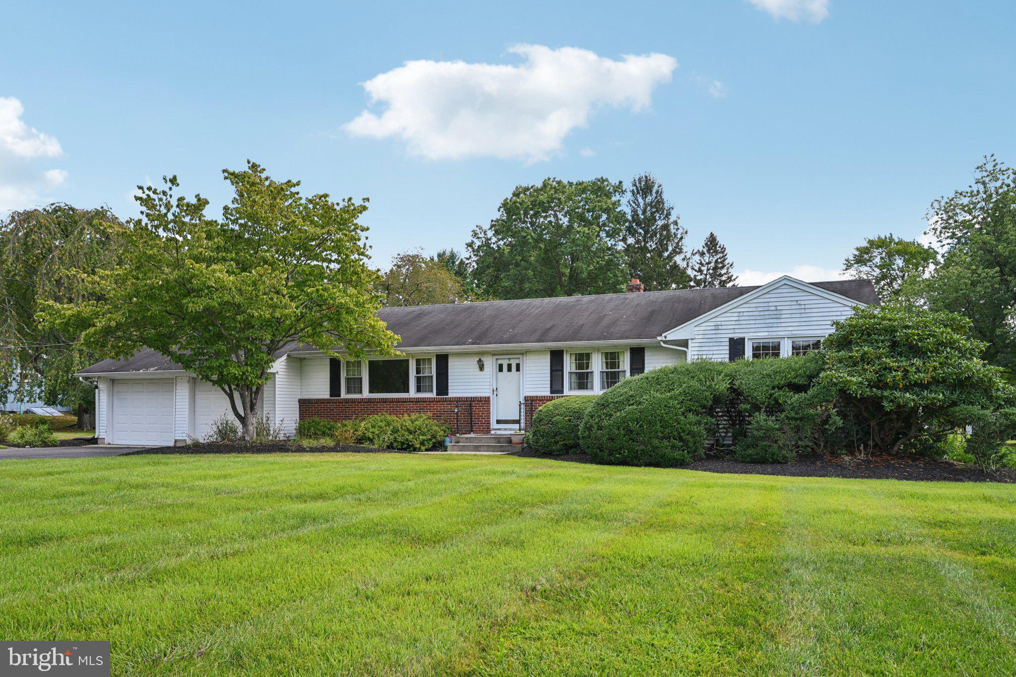 9 Cooper Tomlinson Road Medford, NJ 08055 - Photo 2 of 39 a front view of house with yard and green space