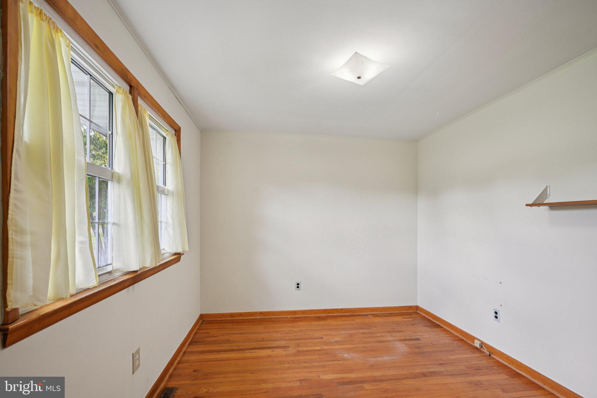 9 Cooper Tomlinson Road Medford, NJ 08055 - Photo 21 of 39 a view of an empty room with a window