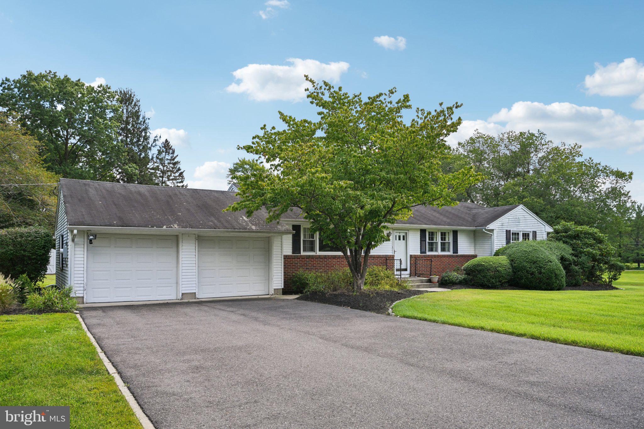 9 Cooper Tomlinson Road Medford, NJ 08055 - Photo 3 of 39 a front view of house with yard and green space