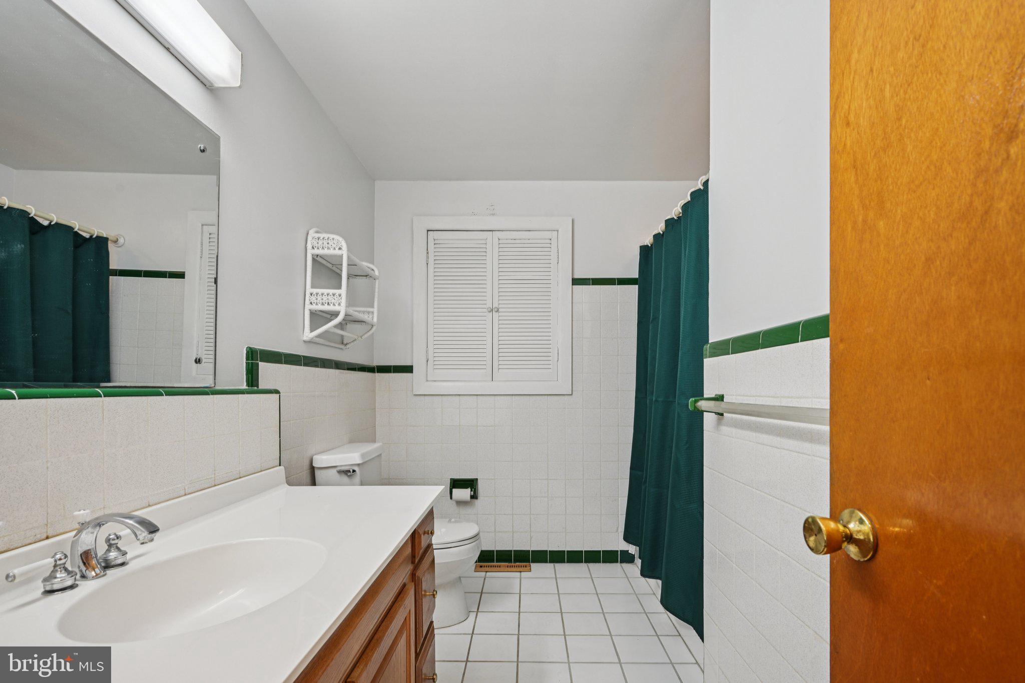 9 Cooper Tomlinson Road Medford, NJ 08055 - Photo 31 of 39 a bathroom with a sink and a mirror