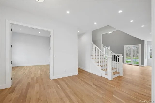 a view of entryway with wooden floor