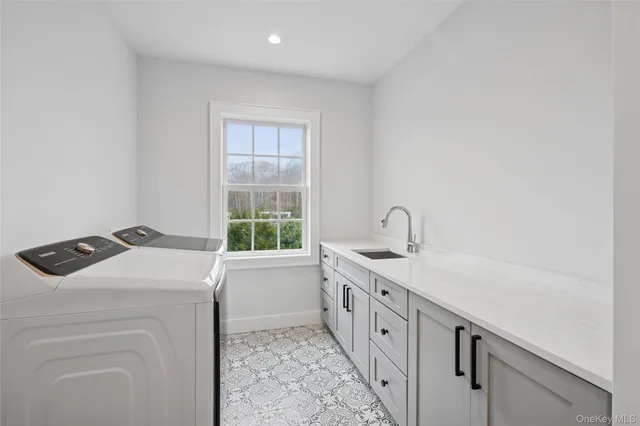a utility room with dryer and washer