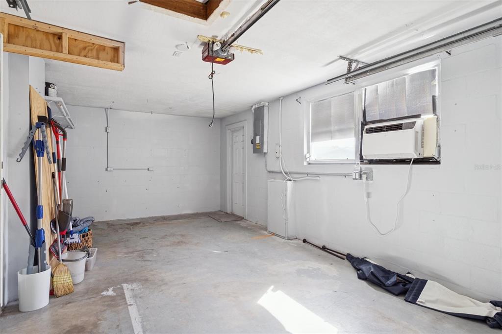 7608 Redcoat Avenue Port Richey, FL 34668 - Photo 26 of 28 a view of a storage & utility room