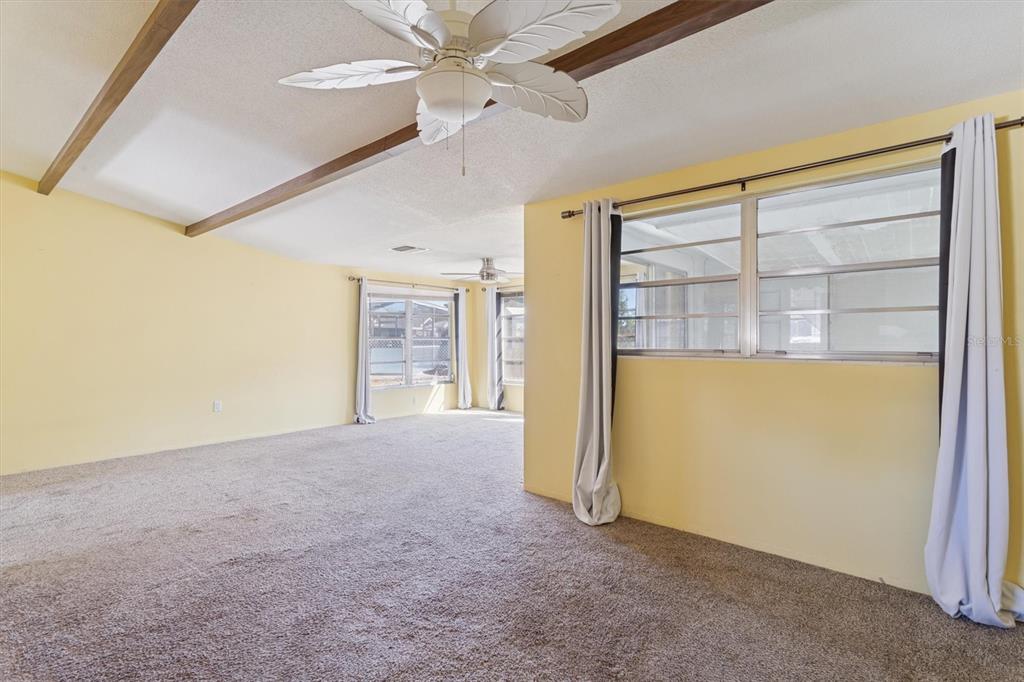 7608 Redcoat Avenue Port Richey, FL 34668 - Photo 8 of 28 a view of an empty room with a window