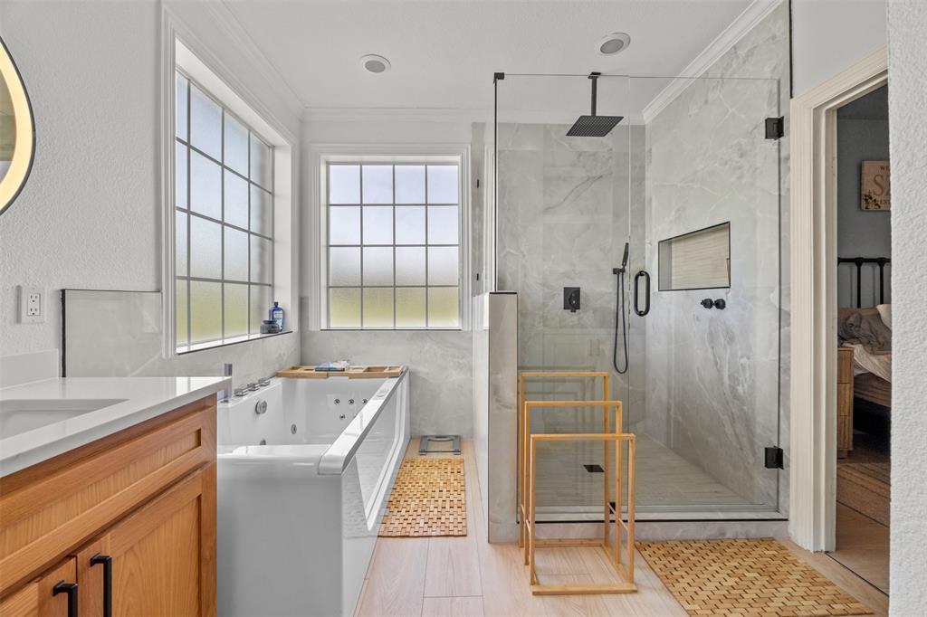 3175 Collins Road Burleson, TX 76028 - Photo 23 of 40 a bathroom with a sink a toilet and shower