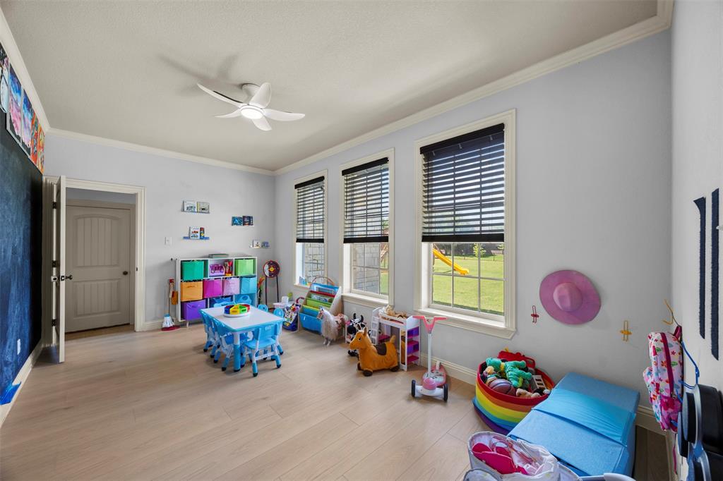 3175 Collins Road Burleson, TX 76028 - Photo 36 of 40 a play room with toys
