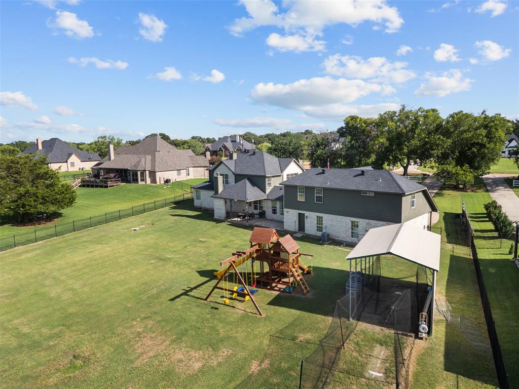 3175 Collins Road Burleson, TX 76028 - Photo 40 of 40 a view of a house with a yard