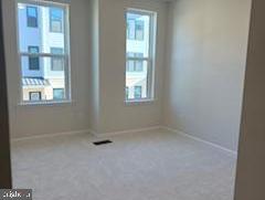 603 Parker Boulevard Princeton Junction, NJ 08540 - Photo 6 of 7 an empty room with windows