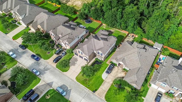 an aerial view of a house with a garden
