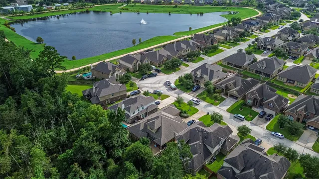 an aerial view of house with yard