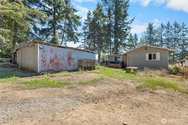 a house with trees in front of it