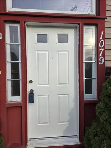 a front view of a house with a window