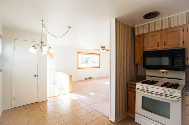 a view of kitchen and utility room