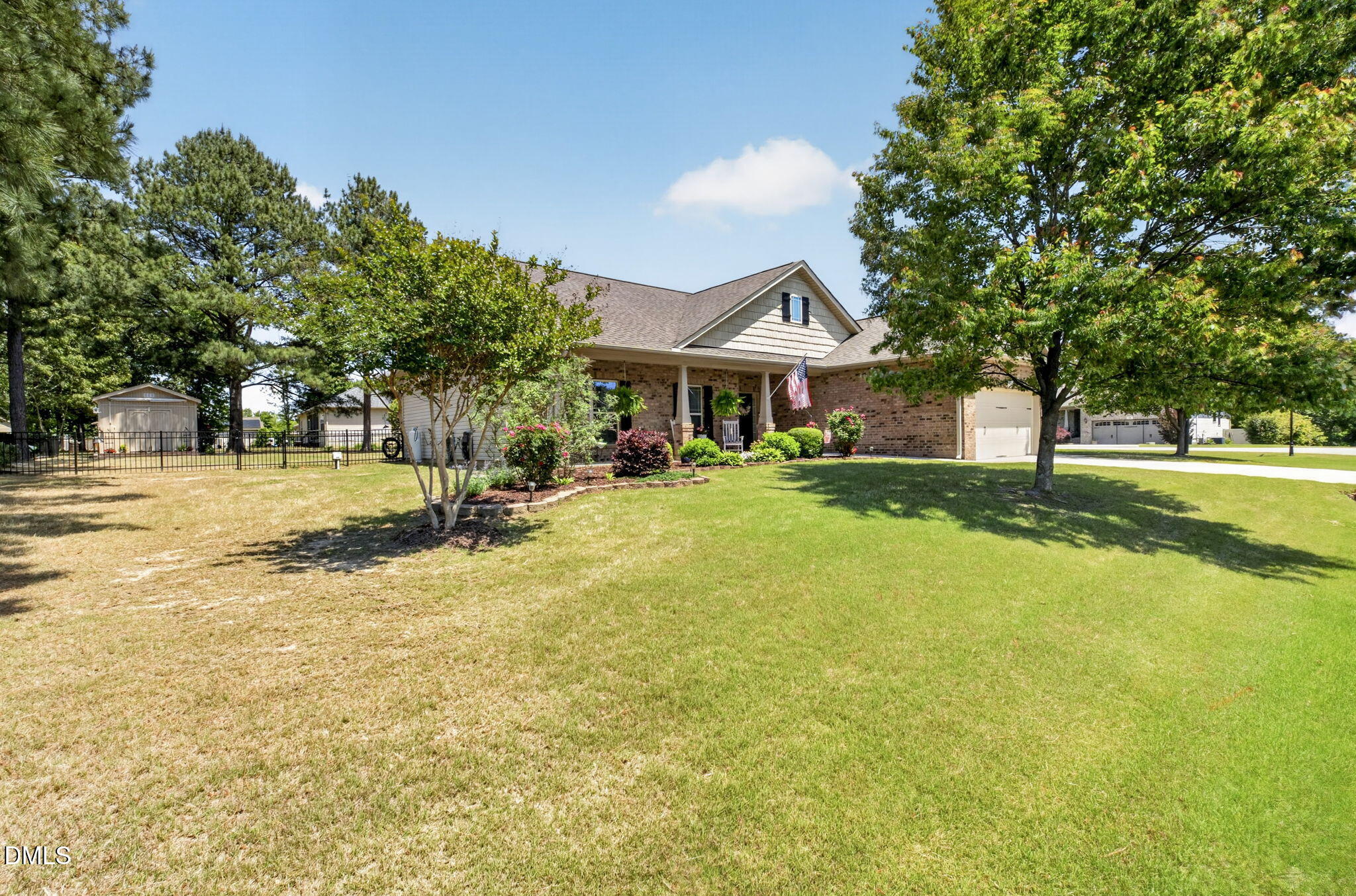 20 Deep Clay Circle Angier, NC 27501 - Photo 2 of 54 a view of a house with a big yard and large trees