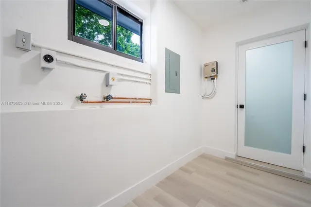 a view of a bathroom with a bathtub
