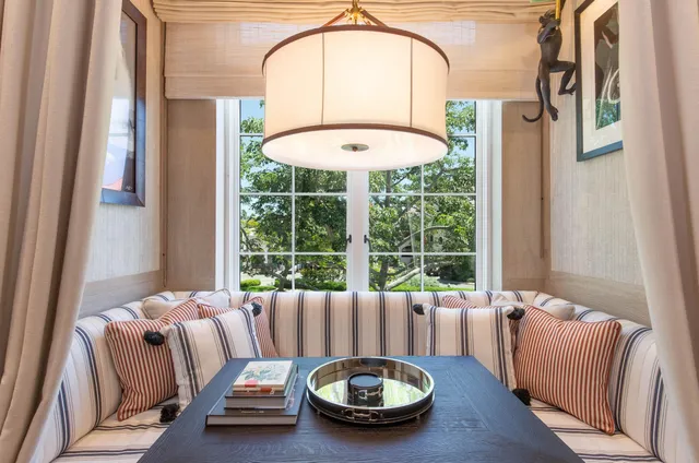 a bathroom with a double vanity sink toilet mirror and shower