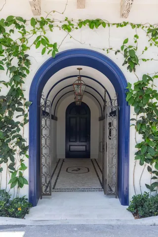 a view of entrance gate of the house