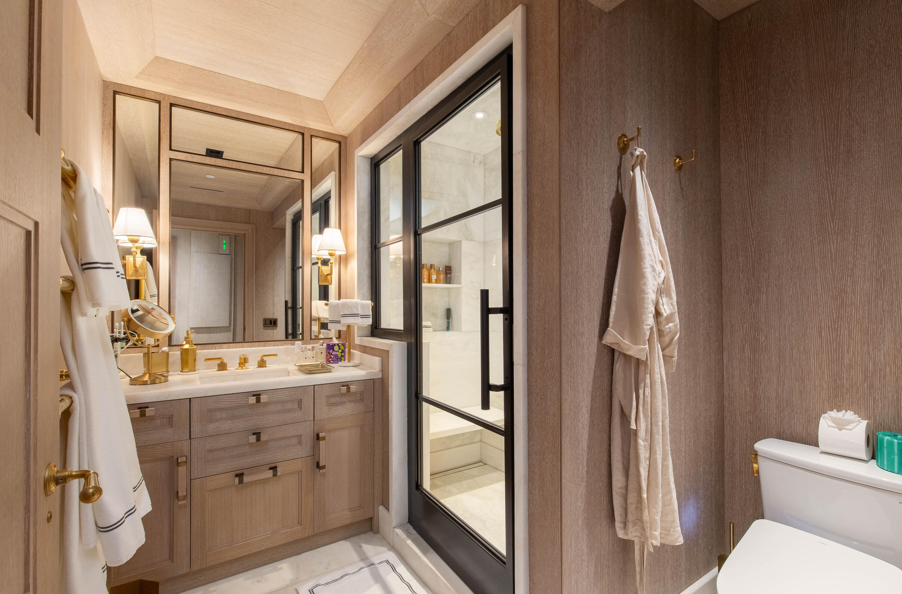 236 Phipps Plaza, Unit D Palm Beach, FL 33480 - Photo 35 of 55 a bathroom with a double vanity sink mirror and toilet