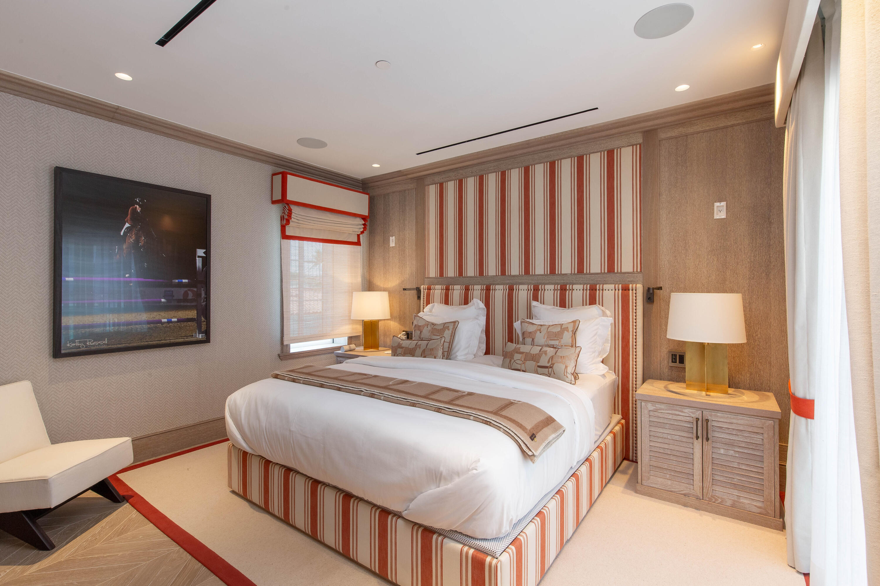 236 Phipps Plaza, Unit D Palm Beach, FL 33480 - Photo 36 of 55 a bedroom with a bed and a painting on the wall