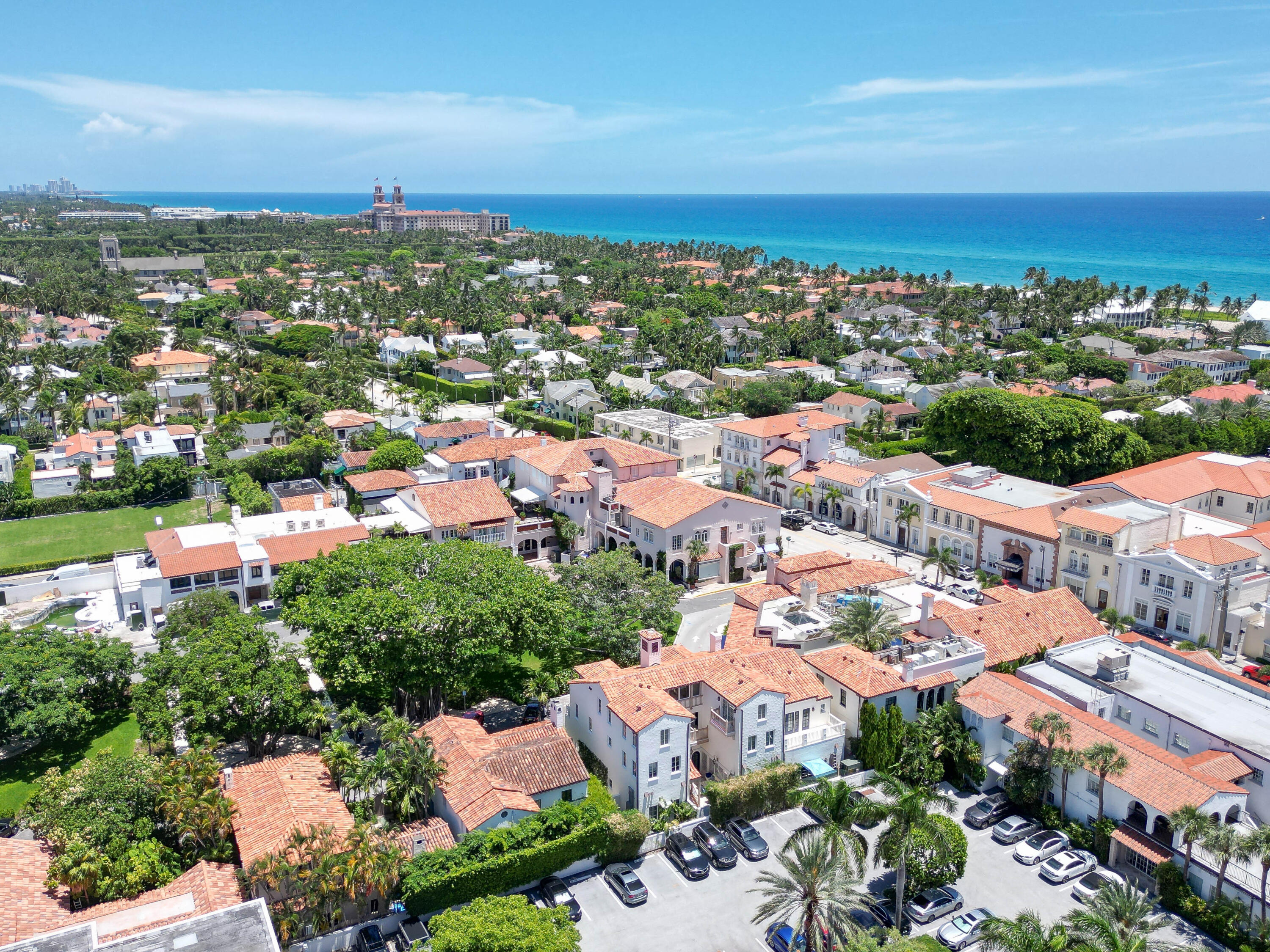 236 Phipps Plaza, Unit D Palm Beach, FL 33480 - Photo 54 of 55 an aerial view of a city with lots of residential buildings ocean and mountain view in back