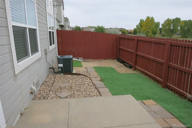a view of a backyard with a garden
