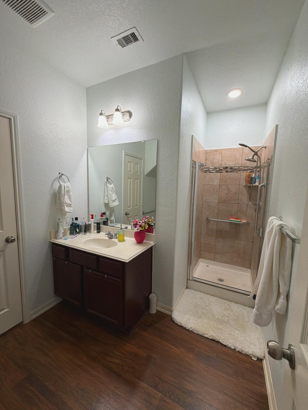 2623 Hunters Side Trail Fresno, TX 77545 - Photo 2 of 12 a bathroom with a sink and mirror