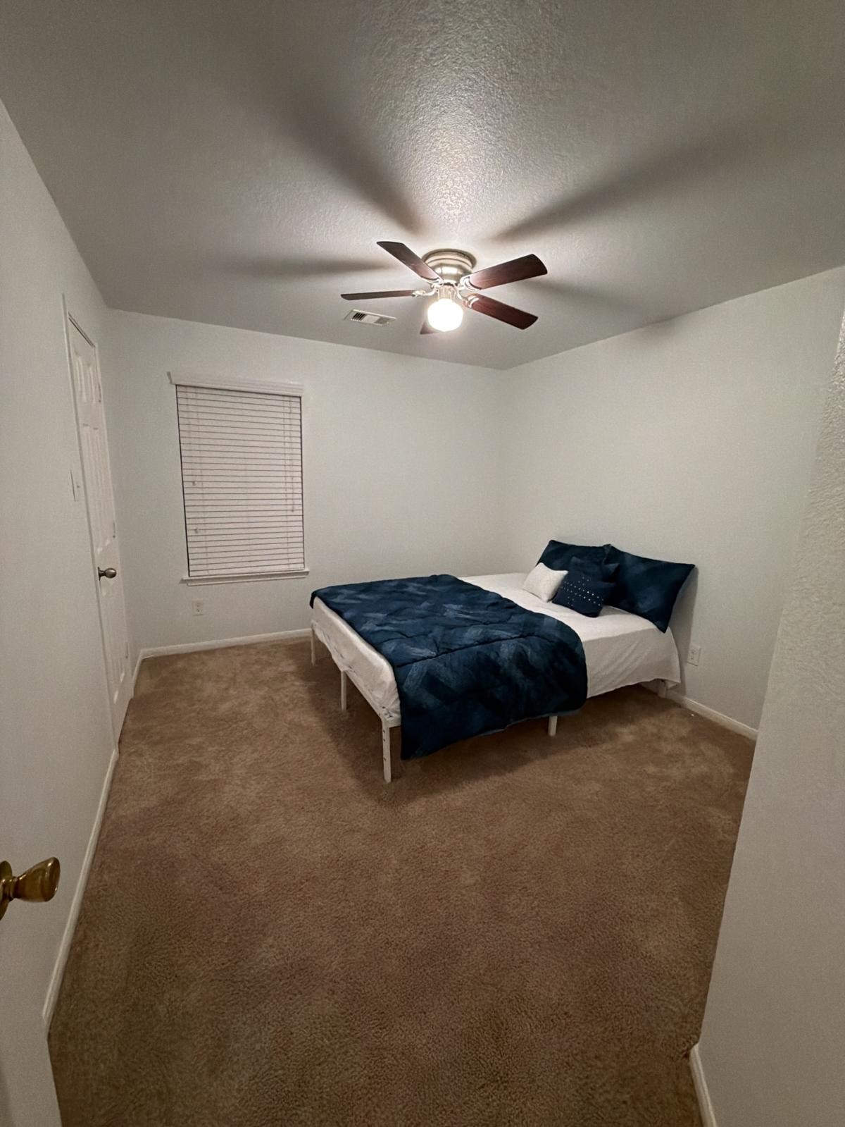 2623 Hunters Side Trail Fresno, TX 77545 - Photo 9 of 12 a living room with furniture and a ceiling fan