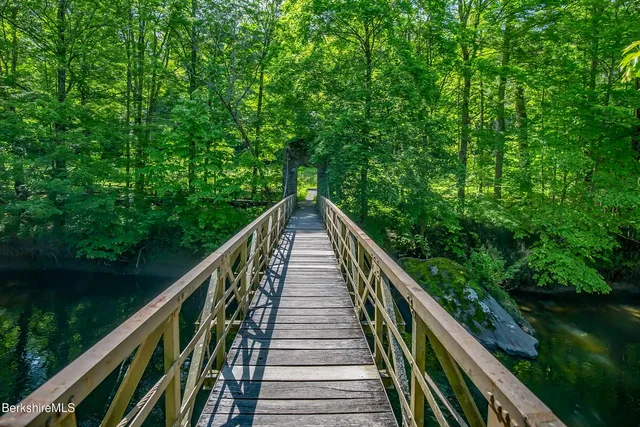 a view of balcony and yard