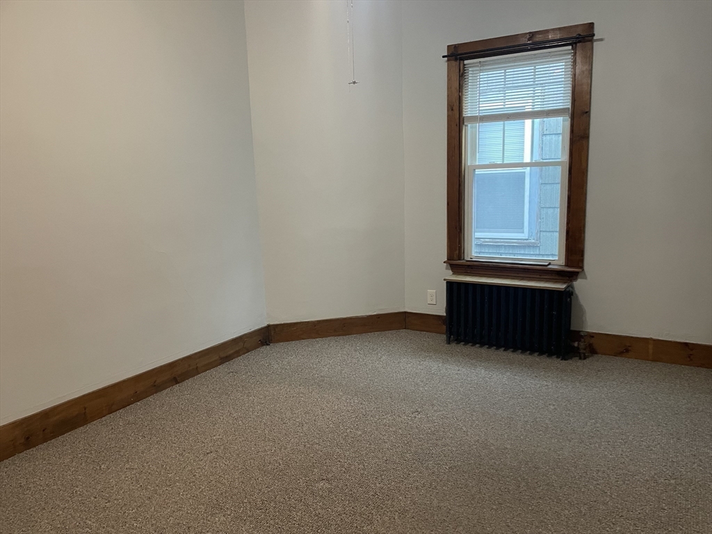 628 East 3rd Street, Unit 2 Boston, MA 02127 - Photo 10 of 21 an empty room with a window