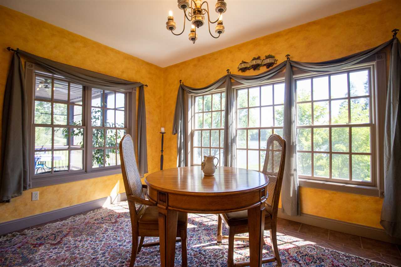 2175 West Cook Road Grand Blanc, MI 48439 - Photo 32 of 63 Dining Room Has Windows On 3 Sides Overlooking The Lake