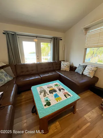 a living room with a couch and a table