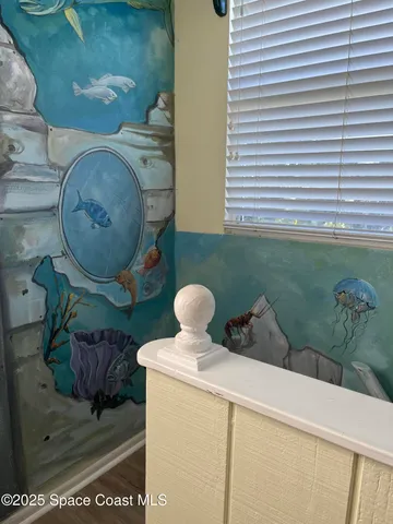 a room with furniture and a window