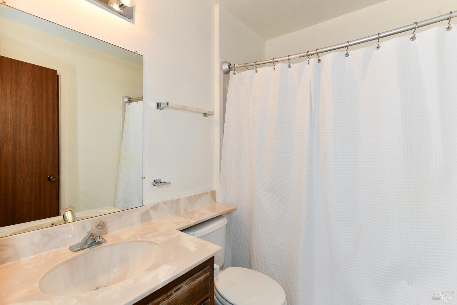 3007 Loma Court Santa Rosa, CA 95405 - Photo 23 of 43 Primary bathroom has shower over the tub.