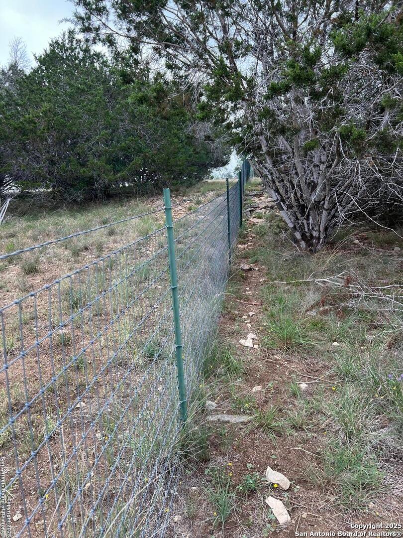 Tbd Oak Ridge Bandera, TX 78003 - Photo 16 of 27 a backyard of a house