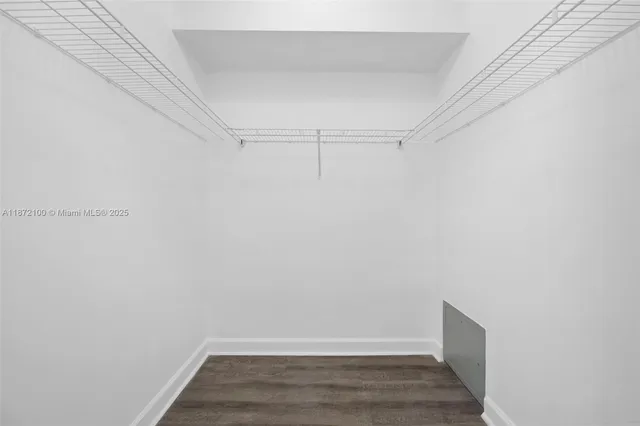 a view of an empty walk in closet