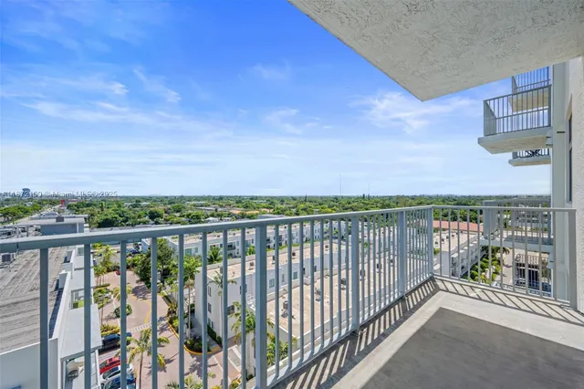 a view of a balcony with city view