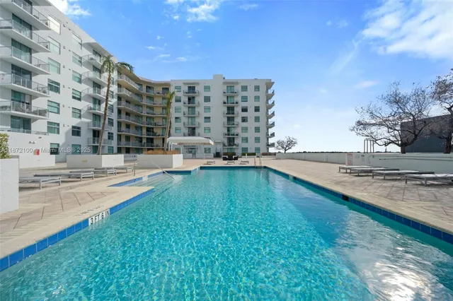 a swimming pool with outdoor view