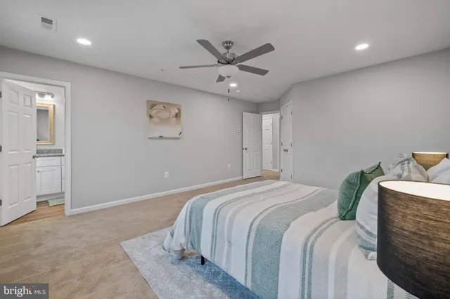 a bedroom with bed and window