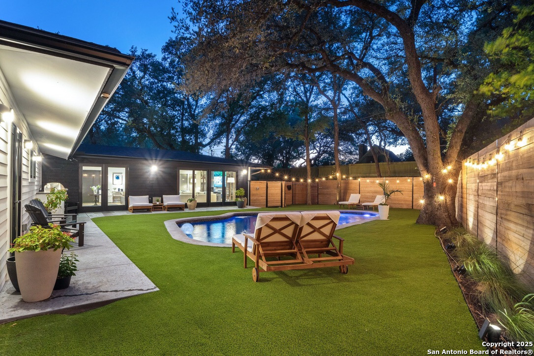 8900 Point W Drive Austin, TX 78759 - Photo 25 of 29 a view of a house with backyard porch and sitting area
