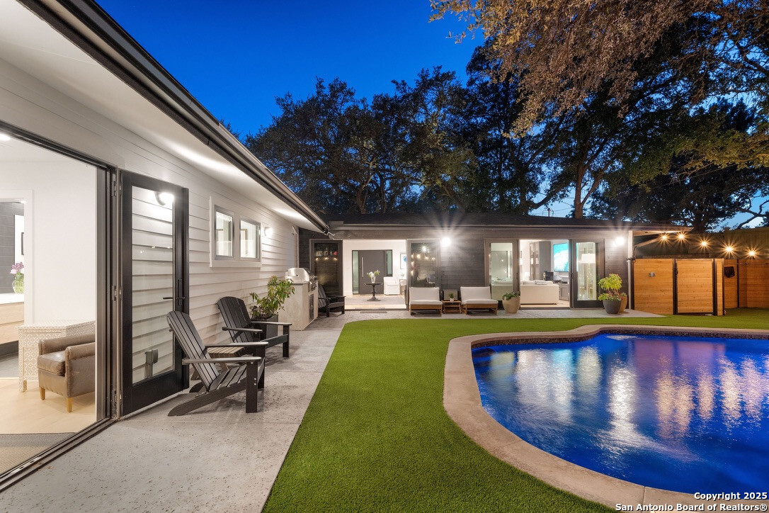 8900 Point W Drive Austin, TX 78759 - Photo 27 of 29 a view of a house with swimming pool and sitting area