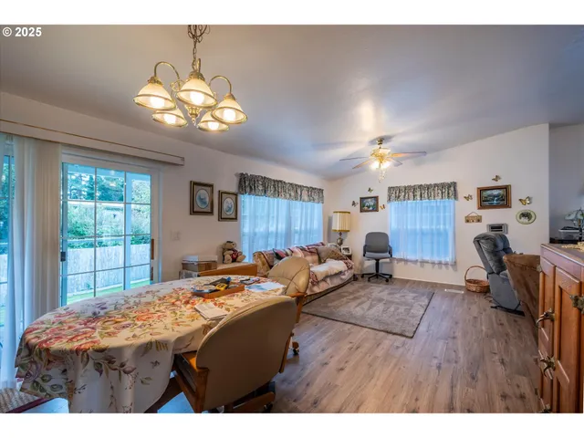 a bed room with a bed mirror and a window