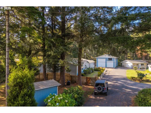 a view of a backyard with sitting area