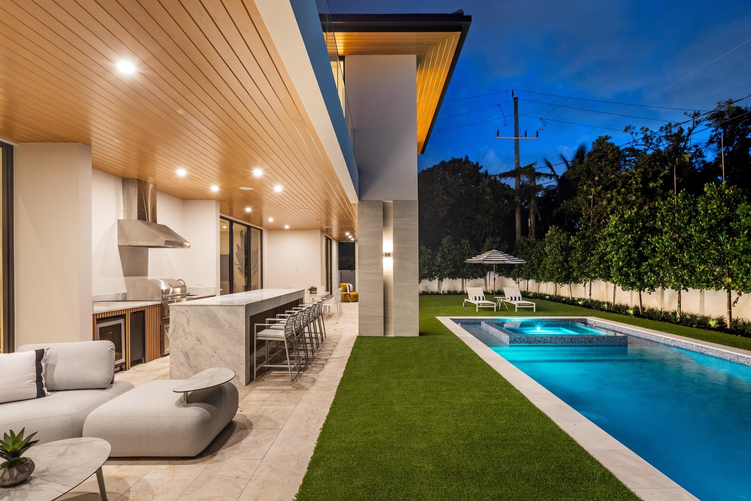 1351 Cocoanut Road Boca Raton, FL 33432 - Photo 6 of 101 POOL / SUMMER KITCHEN TWILIGHT