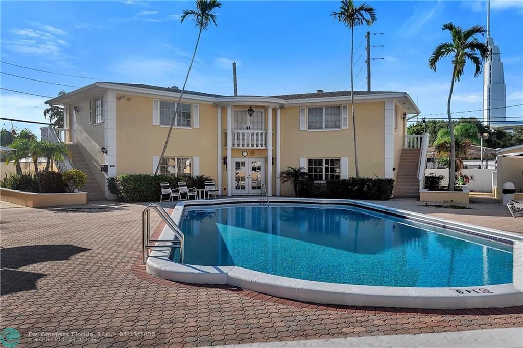 2230 Northeast 56th Place, Unit 208 Fort Lauderdale, FL 33308 - Photo 2 of 23 Common pool, heated & sitting area