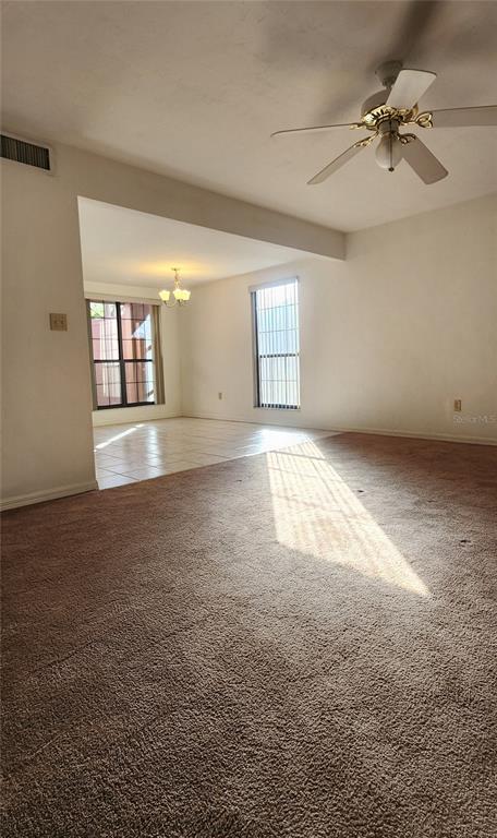 5734 Southwest 8th Place Gainesville, FL 32607 - Photo 6 of 18 a view of an empty room with a window