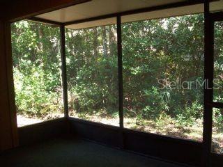 5734 Southwest 8th Place Gainesville, FL 32607 - Photo 10 of 10 a view of window and floor to ceiling window