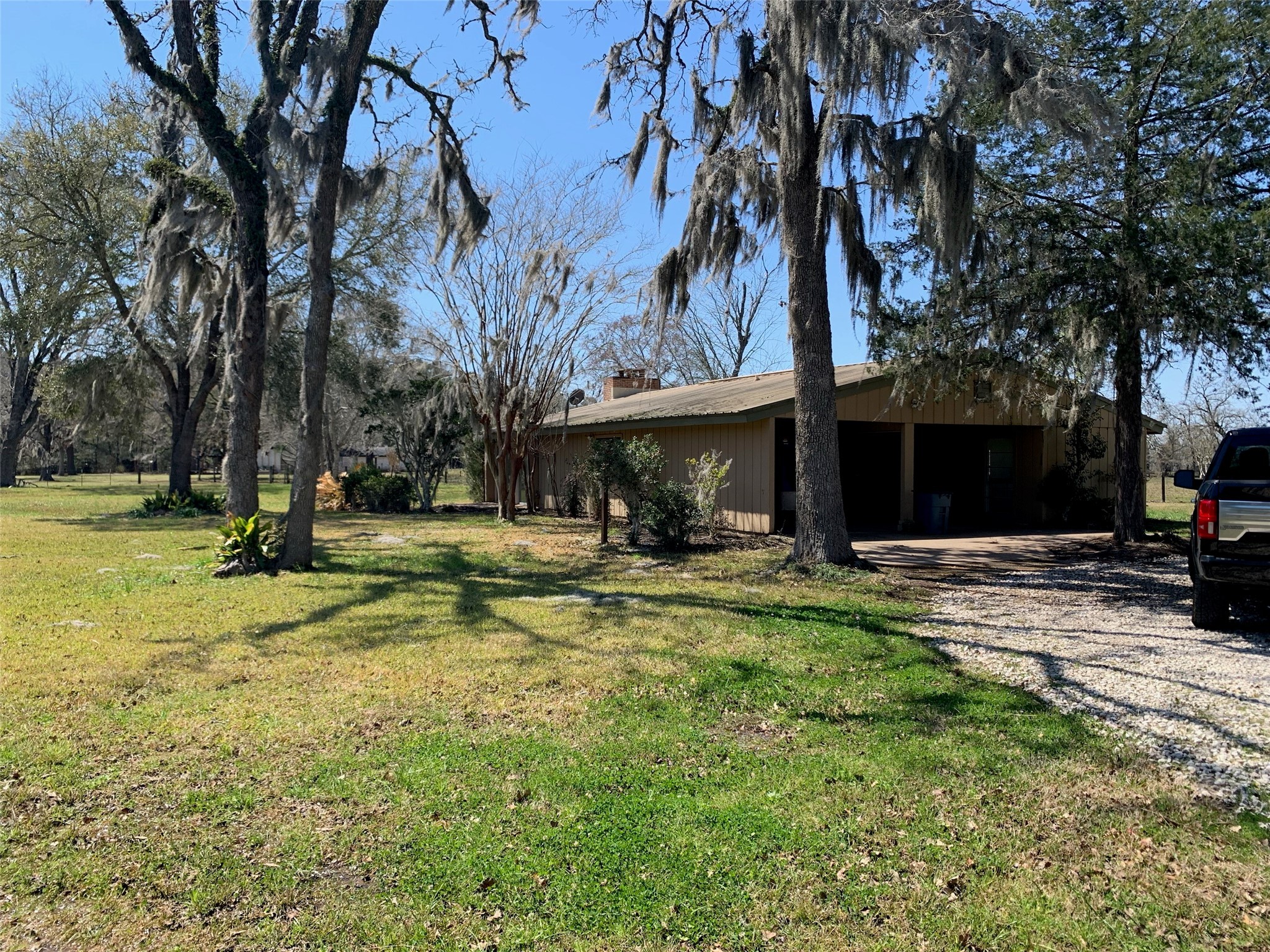 29229 Sheffield Road Waller, TX 77484 - Photo 13 of 16 View of the side of the home/carport.